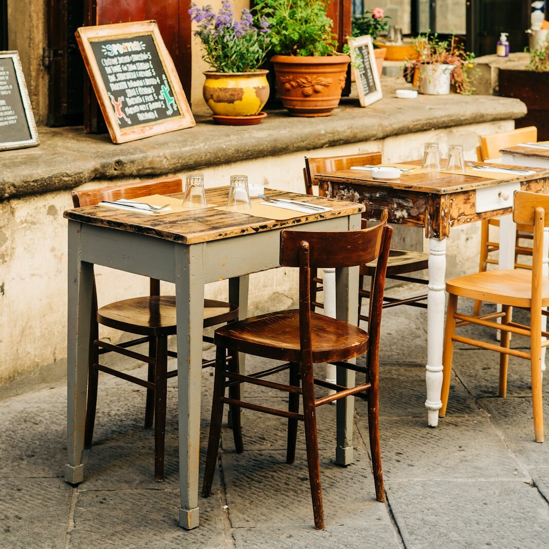 brown wooden table with chairs